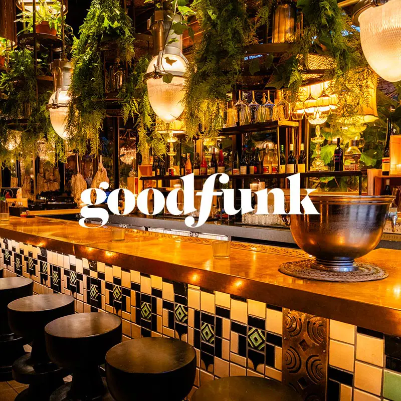 Goodfunk restaurant interior with an overlaying logo
